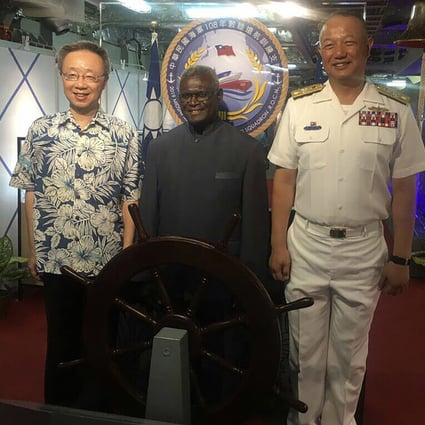 Prime Minister Manasseh Damukana Sogavare (centre) welcomes a Taiwan naval ship to the Solomon Islands in May. The Pacific island nation is reviewing its diplomatic ties with Taiwan. Photo: CNA