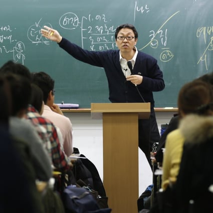 A teacher gives a lecture at an academy in Seoul preparing applicants for entry exams to the civil service. Photo: Reuters
