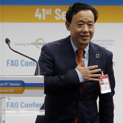 Qu Dongyu reacts after being appointed the new director general of the FAO in Rome on Sunday. Photo: EPA-EFE