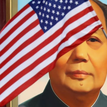 A US flag flutters in front of a portrait of the late Chinese Chairman Mao Zedong during a visit by US President Donald Trump to Beijing, China, in 2017. Photo: Reuters