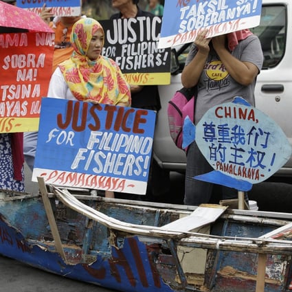 The sinking of a Philippine boat by a Chinese vessel has sparked an outcry in the Philippines, with a rally taking place outside the presidential palace in Manila on June 19. Photo: AP
