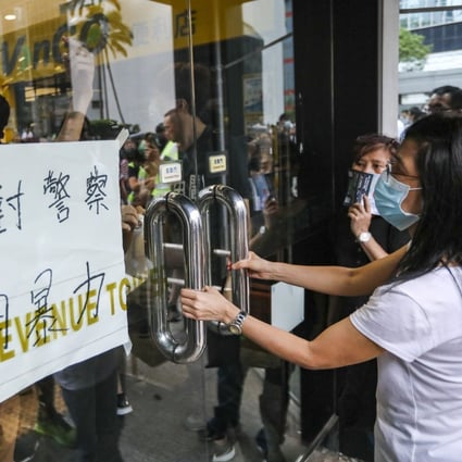 Protesters storm the Revenue Tower in Wan Chai on Monday, demanding the extradition bill be withdrawn. Photo: Felix Wong