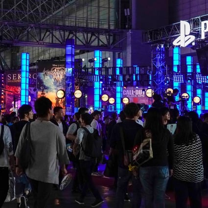 Visitors gather near the Sony PlayStation exhibition booth during the Tokyo Game Show 2018. Photo: EPA-EFE