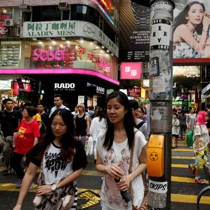Shoppers in Causeway Bay, Hong Kong. PwC sees the city’s retail sales falling 5 per cent for the whole of 2019. Photo: Reuters