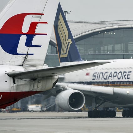 They were once a single carrier, but now Malaysia Airlines struggles to stay afloat while Singapore Airlines remains highly profitable, revealing how starkly their fortunes have diverged. Photo: AFP
