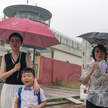 Li Wenzu and Wang Guangwei, the wife and son of jailed lawyer Wang Quanzhang, outside the prison in Shandong with his sister Wang Quanxiu (right). Photo: Handout