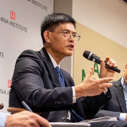 Xiaoxing Xi, Temple University professor, and Aaron Wolfson, lawyer at King & Wood Mallesons, speaking at the China Institute in New York. Photo: China Institute