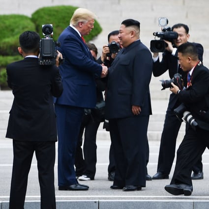 What could have been a breakthrough meeting between US President Donald Trump and North Korean leader Kim Jong-un instead devolved into yet another photo op for the Donald Trump reality show. Photo: AFP
