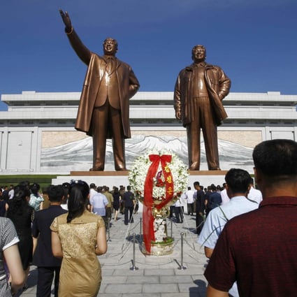 North Koreans visit Mansu Hill to pay tribute to the late leaders Kim Il-sung and Kim Jong-il. Photo: AP