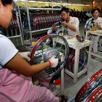 Manufacturers complain that as well as not having China’s famed production capacity and labour efficiency, in Vietnam, they cannot safeguard their asset investments and have to put up with increasingly strict environmental and social security requirements. Photo: Xinhua