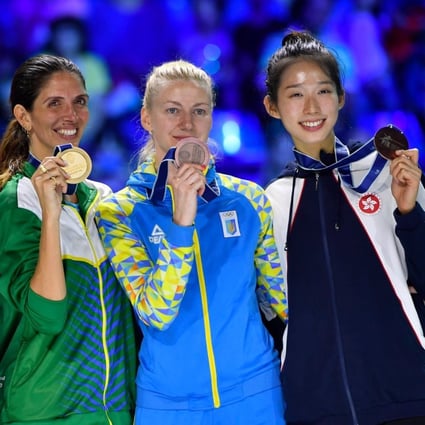 Vivian Kong (right) shows off her bronze medal with the other medal winners at the world championships in Budapest. Photo: FIE/Facebook