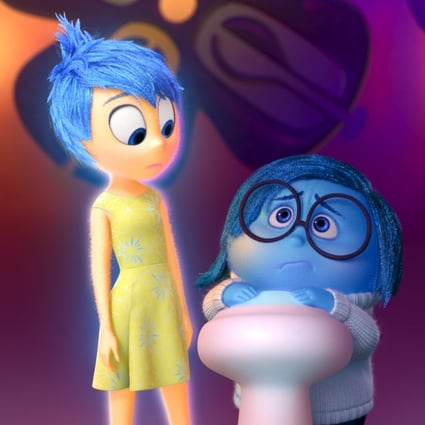 Joy (left, voiced by Amy Poehler) and Sadness (Phyllis Smith) in a still from Inside Out (2015).