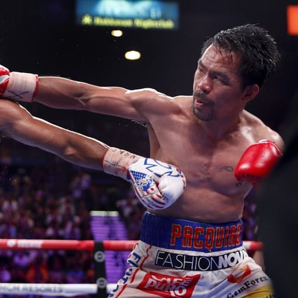 Manny Pacquiao lands a punch on Keith Thurman during his points victory over the defending welterweight champion. Photo: AP