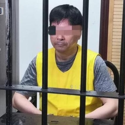 Wang Zhenhua seen behind bars after prosecutors in Shanghai formally charged him. Photo: toutiao