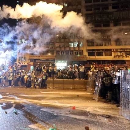 Tear gas is fired during a violent Hong Kong protest, which academic observers fear is the ‘new normal’ for law and order in the city. Photo: Felix Wong