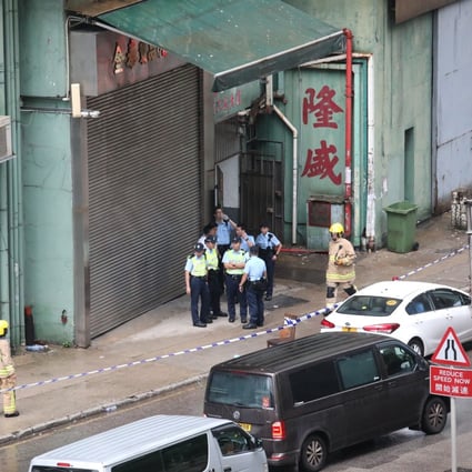Officers at the factory site in Tsuen Wan. Photo: Felix Wong