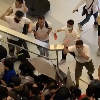White-clad men attacked travellers and passers-by at Yuen Long station on Sunday night. Photo: SCMP Pictures