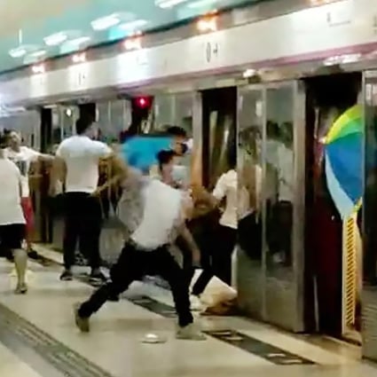 A screen grab from a video showing a group of people in white assaulting passengers at the Yuen Long MTR station. Photo: Handout