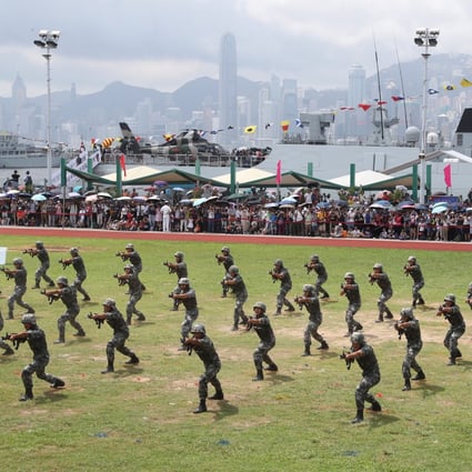 PLA soldiers show their skills during a naval base open day in Hong Kong. The PLA has had a presence in Hong Kong since the city’s return to Chinese sovereignty. Photo: K.Y. Cheng