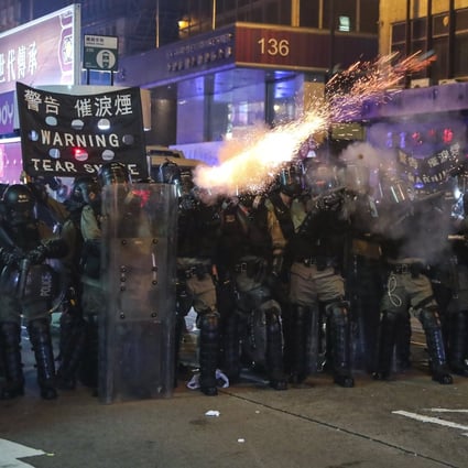 Riot police fire tear gas at protesters during the latest round of clashes in Central. Photo: Sam Tsang