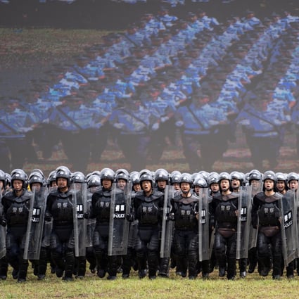 About 190,000 Chinese police officers took part in an exercise in Guangdong province on Tuesday. Photo: Reuters