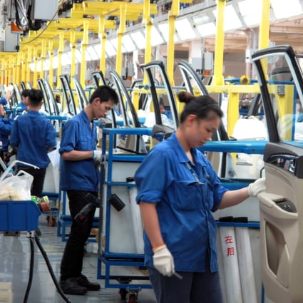 The official purchasing managers’ index (PMI) rose slightly to 49.7 from 49.4 in both May and June, the National Bureau of Statistics said on Wednesday. Photo: Reuters