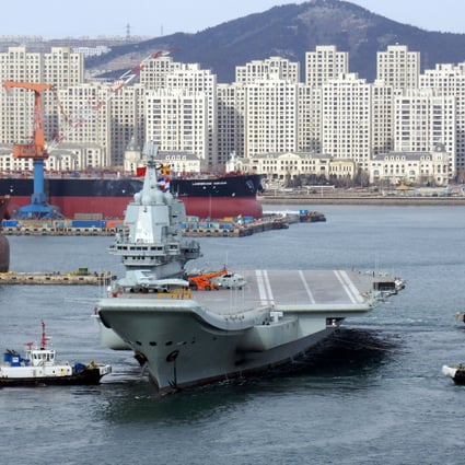 The carrier leaves the port of Dalian for a sea trial in December. Photo: Reuters