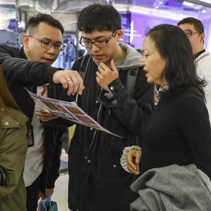 Potential homebuyers visit the showroom of the The Vantage, a Henderson Land Development, on March 9, 2019. Photo: Edmond So