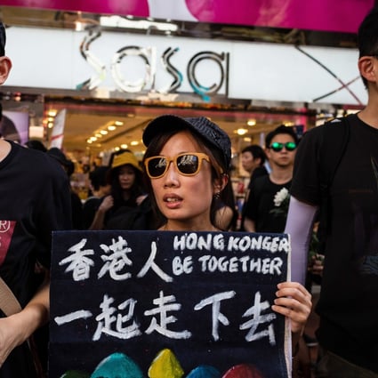 Hong Kong has to save itself and every Hongkonger is in this together – a sentiment expressed by a protester on July 1. Photo: Bloomberg