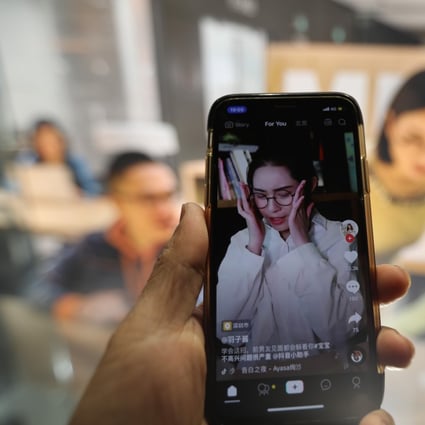 A smartphone shows living streaming of Douyin, also know as TikTok overseas, in Beijing on Mar. 22, 2019. 22MAR19 SCMP/Simon Song
