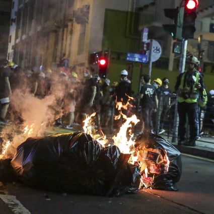 Protesters set fires in Mong Kok on Saturday. Photo: Edmond So