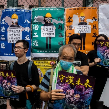 Protesters at a rally against the government in Mong Kok on Saturday. With workers from various sectors expected to join the strike, Hong Kong could see large-scale disruptions on Monday. Photo: AFP