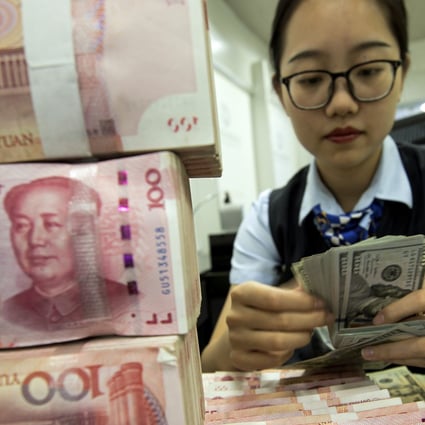 The Chinese yuan depreciated below 7 to the US dollar on Monday for the first time since 2008. Photo: AP