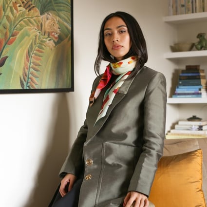 London-based Thai designer Lisa King in one of her vibrant scarf prints, called Spring Frost, worn with a Teatum Jones jacket. Photo: Thomas Serre