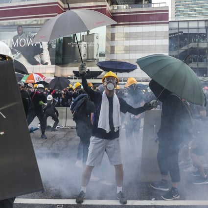 Tear gas is used on anti-government protesters after they occupy Harcourt Road in Admiralty during another day of unrest on Monday. Photo: Sam Tsang