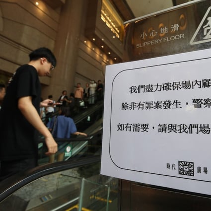 A notice posted at Times Square in Causeway Bay tells customers that unless a crime is being committed, police are asked not to enter the shopping centre. Photo: Winson Wong
