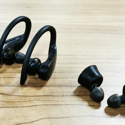 Powerbeats Pro headphones from Beats (left) and a pair of the new Klipsch T5 True Wireless earbuds, but which type has your ear? Photos: Winnie Chung