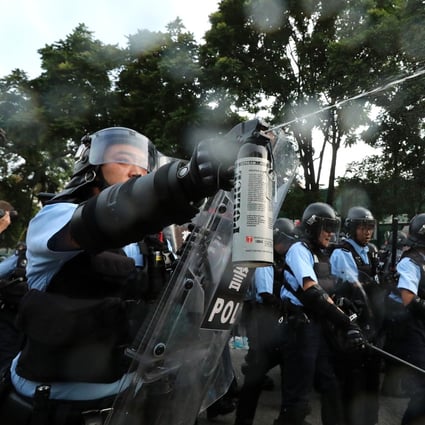 Protesters clash with police after a march in Sheung Shui on July 13, 2019. Photo: Felix Wong