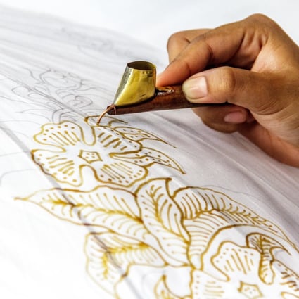 Batik is a technique of wax-resistant dyeing applied to cloth that originates in Indonesia. While mostly associated with traditional wear, Malaysian designer Fern Chua is bringing it up to date with her clothing collection. Photo: Alamy