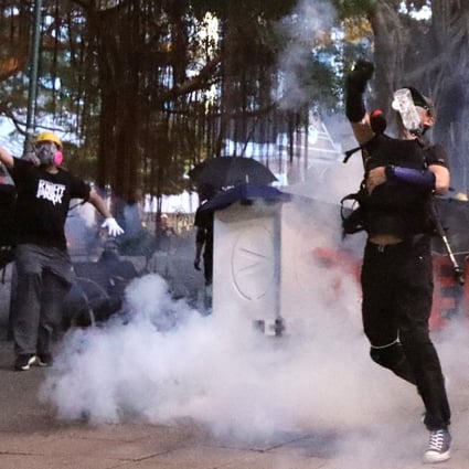 Tear gas is deployed against anti-government protesters in Hong Kong on the weekend. A Taiwan politician has been accused of breaching the self-ruled island’s national security laws by calling for donations of supplies for the demonstrators. Photo: Felix Wong