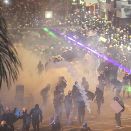 Riot police officers clash with protesters at the junction of Lockhart Road and Percival Street in Causeway Bay. Photo: Winson Wong