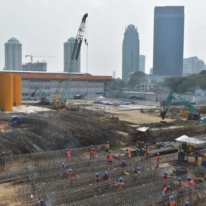 Indonesian labourers work on a construction site in Jakarta. Photo: AFP