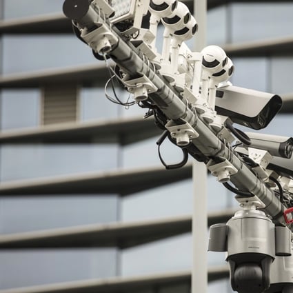 Surveillance cameras are mounted on a post in Hangzhou, China, May 28, 2019. Photo: Bloomberg