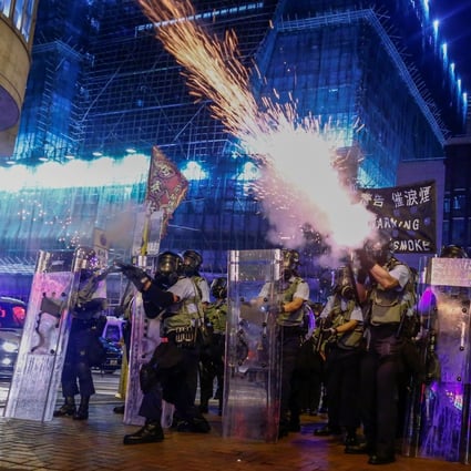 Police fire tear gas at anti-extradition bill protesters during clashes in Sham Shui Po in Hong Kong on August 14, 2019. Photo: Reuters