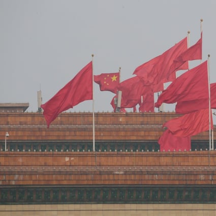 Red flags flutter on the top of the Great Hall of the People in Beijing. Photo: Reuters