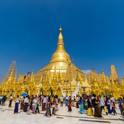 Tourists at the Shwedagon Pagoda, in Yangon, Myanmar. Photo: Shutterstock