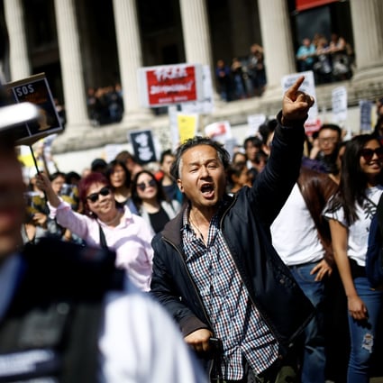 Supporters of the protests in Hong Kong take part in a march in London on August 17. There has been a wave of support across the world for protesters in Hong Kong. Photo: Reuters