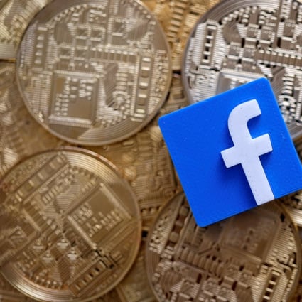 A 3-D printed Facebook logo is seen on representations of the Bitcoin virtual currency in this illustration picture, June 18, 2019. Photo: Reuters