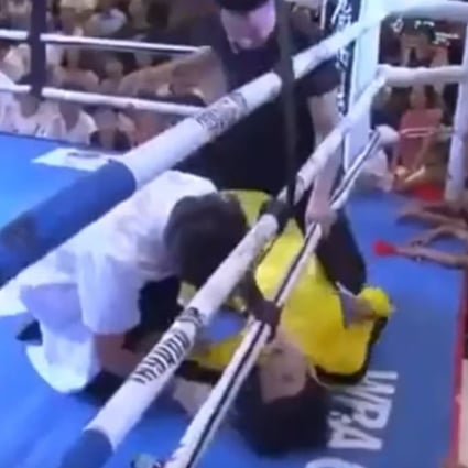 Tan Long lies flat on the canvas after being knocked out by Xuan Wu. Photos: YouTube/Fight Commentary Breakdowns