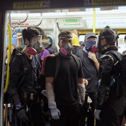 Anti-government protesters were out in force at Yuen Long MTR station on Wednesday night. Photo: AP